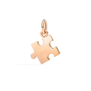 Ciondolo puzzle in oro rosa 9K versione destra, dettaglio design a incastro e superficie liscia.